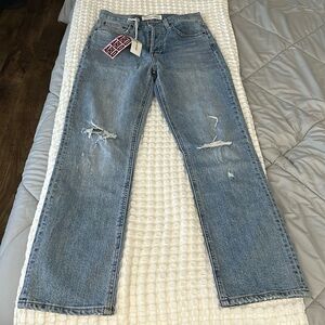 DENIM FORUM slightly ripped jeans